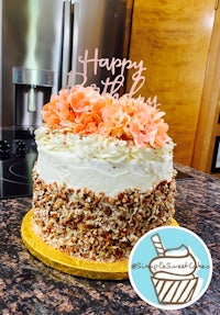 a cake with a happy birthday sign on top